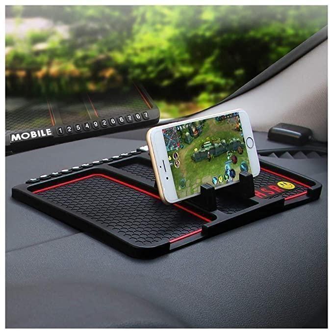 Car dashboard non-slip mat with smartphone holder displaying a mobile game screen